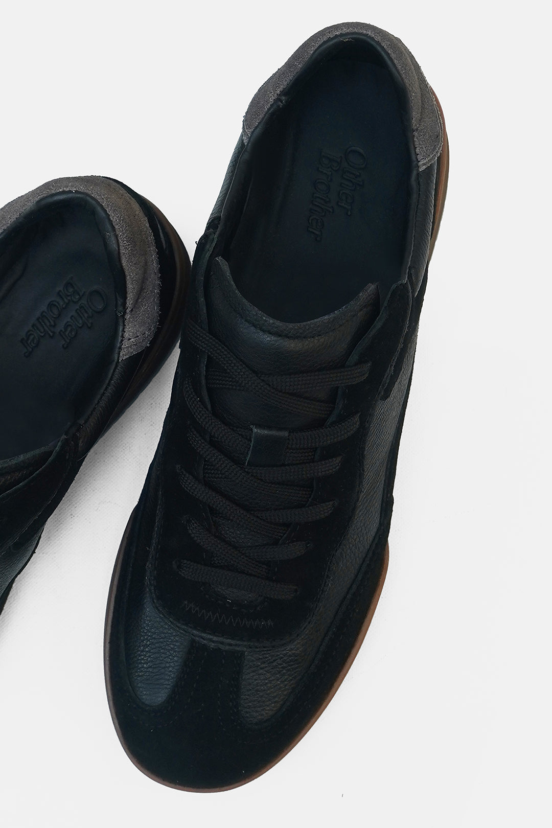 Image of G.O.A.T Leather Trainers